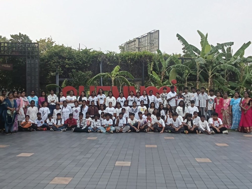 Students outside the cinema before a movie outing at V.R. Mall